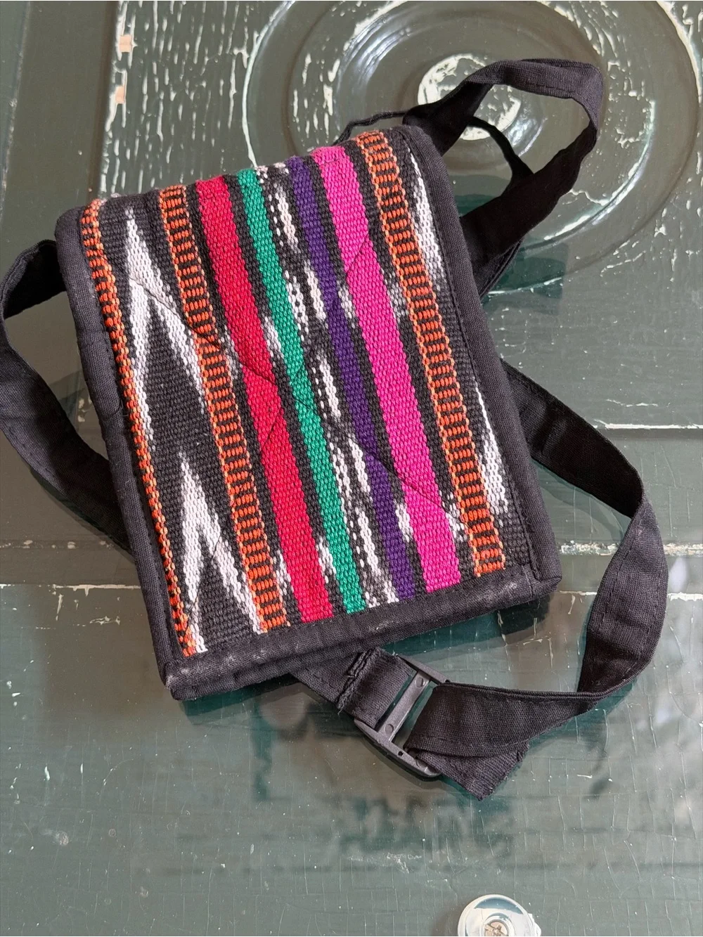 Black Woven Crossbody Bag with Multicolor Stripe Accents